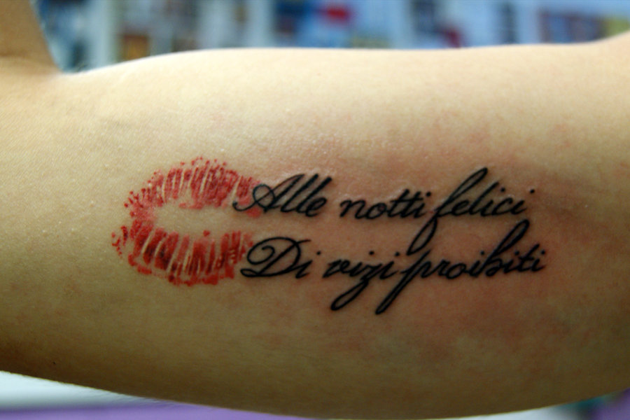 kiss tattoos meaning