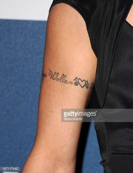 Teri Polo Tattoo Stock, and, Getty Images. 